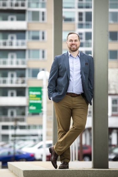 Charles Davidson standing outside smiling