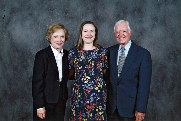 Susan Allen standing in between Rosalynn and Jimmy Carter