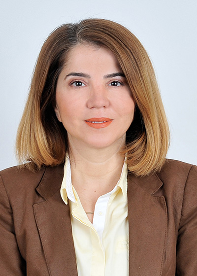 Azime Telli in professional attire