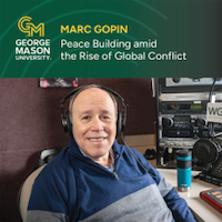 Marc Gopin wearing headphones in a radio studio