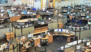 Wide shot of the Fairfax 911 Call Center, with computers and screens throughout