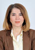 Azime Telli in professional attire
